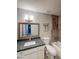 Bathroom with granite countertop, updated tile work, shower and bath combo at 1553 E Flower Cir, Mesa, AZ 85204
