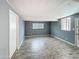 Versatile flex space features wood-style flooring, natural light, and neutral paint, perfect for any use at 1553 E Flower Cir, Mesa, AZ 85204