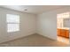 Bedroom featuring natural light and doorway access to the bathroom at 1634 W Red Bird Rd, Phoenix, AZ 85085