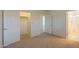 Bedroom features a walk-in closet and an ensuite bathroom, providing comfort and privacy at 1634 W Red Bird Rd, Phoenix, AZ 85085