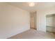 Bedroom featuring plush carpeting, a closet, and neutral walls offering a calming retreat at 1634 W Red Bird Rd, Phoenix, AZ 85085