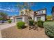 Attractive two-story home with a two-car garage and a meticulously maintained xeriscaped front yard at 1634 W Red Bird Rd, Phoenix, AZ 85085