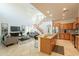 Open concept showcasing kitchen, staircase and living room, great for modern living and entertaining at 1634 W Red Bird Rd, Phoenix, AZ 85085