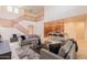 Expansive living area flows into the kitchen and staircase, perfect for modern living and entertaining at 1634 W Red Bird Rd, Phoenix, AZ 85085