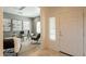 Stylish home office with neutral tones, modern furnishings, and ample natural light at 1634 W Red Bird Rd, Phoenix, AZ 85085