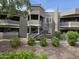 Exterior view of apartment building with mature landscaping at 1720 E Thunderbird Rd # 2087, Phoenix, AZ 85022