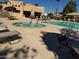 Outdoor pool area with lounge chairs, hot tub, and ample space for relaxation at 17224 N Zuni Trl, Surprise, AZ 85374
