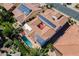 Stunning aerial view of home featuring tile roof, courtyard and solar panels at 1787 E Sattoo Way, Queen Creek, AZ 85140