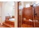Elegant bathroom with a shower, a luxurious soaking tub, and decorative tile at 1787 E Sattoo Way, Queen Creek, AZ 85140