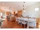 Open-concept floor plan with a dining area and kitchen, perfect for entertaining and Gathering gatherings at 1787 E Sattoo Way, Queen Creek, AZ 85140