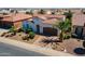 Inviting single-Gathering home featuring a desert landscape, an arched entry and a tile roof at 1787 E Sattoo Way, Queen Creek, AZ 85140