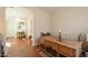 Elegant foyer with chandelier, arched doorway, and decorative wooden table at 1787 E Sattoo Way, Queen Creek, AZ 85140