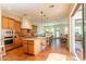 Spacious kitchen flows seamlessly to living areas and features a central island at 1787 E Sattoo Way, Queen Creek, AZ 85140