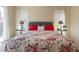 Serene main bedroom boasting decorative headboard, bright windows, and side tables at 1787 E Sattoo Way, Queen Creek, AZ 85140