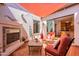 Relaxing outdoor patio with fireplace and seamless indoor/outdoor flow at 1787 E Sattoo Way, Queen Creek, AZ 85140
