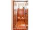 Tiled shower stall featuring a built-in bench, sleek fixtures, and a glass enclosure at 1787 E Sattoo Way, Queen Creek, AZ 85140