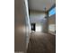 Bright living space featuring high ceilings, large windows, a staircase and neutral color palette at 1810 N Mcdonald St, Casa Grande, AZ 85122