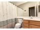 Standard bathroom includes a toilet and sink vanity with a mirror at 18221 N 49Th Pkwy, Glendale, AZ 85308
