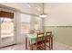Bright dining area featuring a window view with seating for four at 18221 N 49Th Pkwy, Glendale, AZ 85308