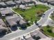 This aerial shot shows the property's proximity to the neighborhood park, streets, and other houses at 2351 E Cherrywood Pl, Chandler, AZ 85249