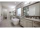 Stylish bathroom showcases dual sinks, soaking tub, and decorative tile for a spa-like experience at 2351 E Cherrywood Pl, Chandler, AZ 85249