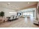Elegant dining room with designer lighting, a large dining table, and neutral decor at 2351 E Cherrywood Pl, Chandler, AZ 85249