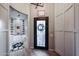 Inviting foyer featuring a frosted glass front door and a decorative shelving nook at 2351 E Cherrywood Pl, Chandler, AZ 85249