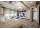 Spacious main bedroom with integrated media center, abundant light, and en-suite access to the closet at 2351 E Cherrywood Pl, Chandler, AZ 85249