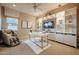 Modern home office featuring custom built-ins, desk, and a massage chair at 2351 E Cherrywood Pl, Chandler, AZ 85249