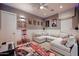 Home theater boasts comfortable seating, fun decor, and a popcorn machine for the full cinema experience at 2351 E Cherrywood Pl, Chandler, AZ 85249