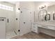 Bright bathroom with vanity and glass enclosed shower at 2552 E Silverwood Dr, Phoenix, AZ 85048