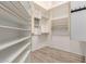 Walk-in closet with shelves at 2552 E Silverwood Dr, Phoenix, AZ 85048