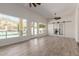 Bright living room with a view of the fireplace and backyard swimming pool at 2552 E Silverwood Dr, Phoenix, AZ 85048
