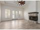 Bright living room with wood floors and fireplace at 2552 E Silverwood Dr, Phoenix, AZ 85048