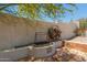 Cozy outdoor kitchen featuring a built-in grill and convenient wood storage at 2552 E Silverwood Dr, Phoenix, AZ 85048