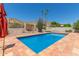 Stunning pool area with desert views and privacy fencing, perfect for outdoor relaxation and entertainment at 2552 E Silverwood Dr, Phoenix, AZ 85048