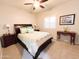 Comfortable bedroom featuring a ceiling fan, and a queen-sized bed at 25935 W Potter Dr, Buckeye, AZ 85396