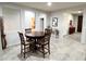 Dining room with wood table and chairs at 25935 W Potter Dr, Buckeye, AZ 85396