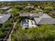 Lovely desert home featuring a backyard pool, manicured lawn, putting green, desert landscaping, and mountain views at 26099 N 88Th Way, Scottsdale, AZ 85255