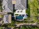 Aerial view of a private backyard oasis with pool, spa, patio, and putting green at 26099 N 88Th Way, Scottsdale, AZ 85255