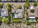 Stunning aerial view of a desert home with pool, putting green, desert landscaping, and mountain views at 26099 N 88Th Way, Scottsdale, AZ 85255