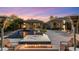 Stunning backyard featuring a pool, spa, outdoor seating, and lush landscaping, perfect for entertaining and relaxing at 26099 N 88Th Way, Scottsdale, AZ 85255