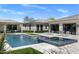 Stunning pool area with a spa, lush landscaping, and elegant architecture, offering a private oasis for relaxation and recreation at 26099 N 88Th Way, Scottsdale, AZ 85255