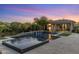 Gorgeous pool area featuring a serene waterfall, spa, and lush landscaping, creating a peaceful outdoor oasis at 26099 N 88Th Way, Scottsdale, AZ 85255