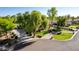 Aerial view showcasing the property's beautifully landscaped front yard and circular driveway at 2641 E Birchwood Pl, Chandler, AZ 85249