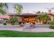 Outdoor living at its finest, complete with beautiful landscaping, mature trees, and ample entertaining space at 2641 E Birchwood Pl, Chandler, AZ 85249