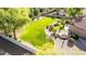 Aerial view of a spacious backyard with a large grassy area, perfect for outdoor activities at 2641 E Birchwood Pl, Chandler, AZ 85249