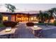 Beautifully landscaped backyard with a stone pathway and covered patio, ideal for relaxing and enjoying the outdoors at 2641 E Birchwood Pl, Chandler, AZ 85249