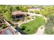 An aerial shot captures a large backyard complete with a basketball court, landscaping, and mature trees at 2641 E Birchwood Pl, Chandler, AZ 85249