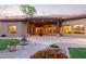 Stunning backyard with a covered patio, manicured landscaping, and a tranquil ambiance for relaxing at 2641 E Birchwood Pl, Chandler, AZ 85249